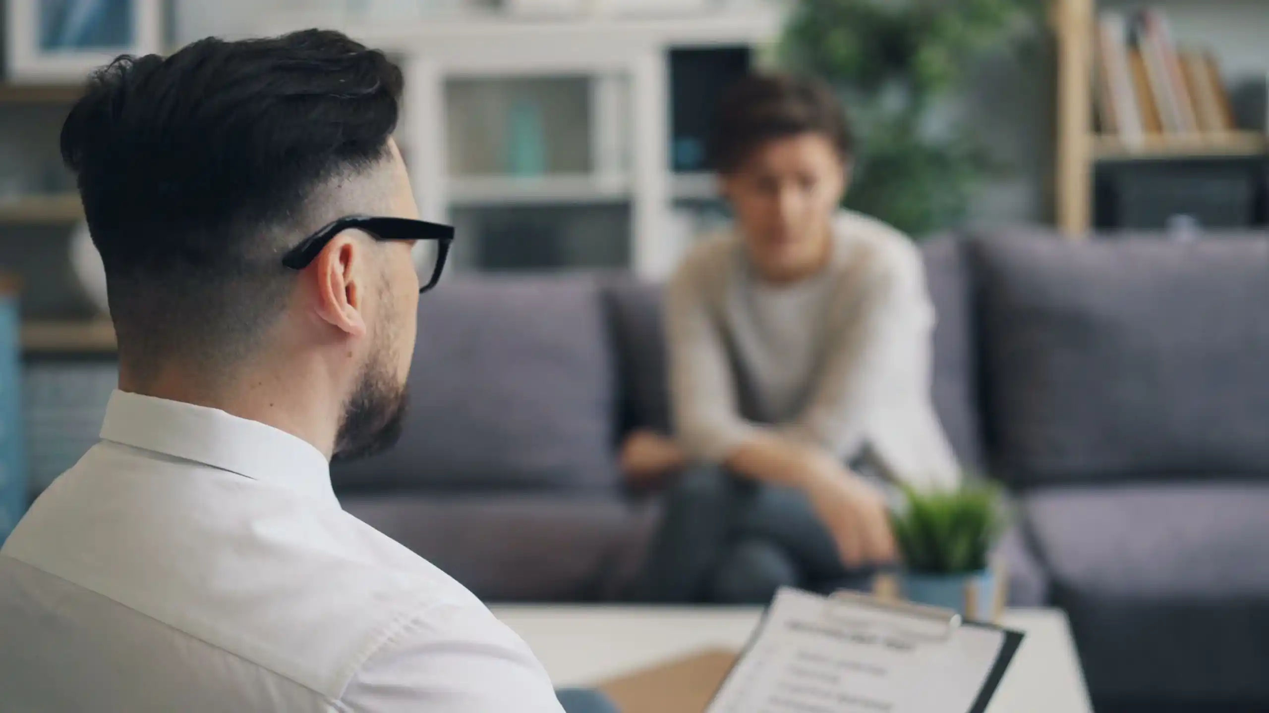Man in a counseling setting, representing mental and emotional health support